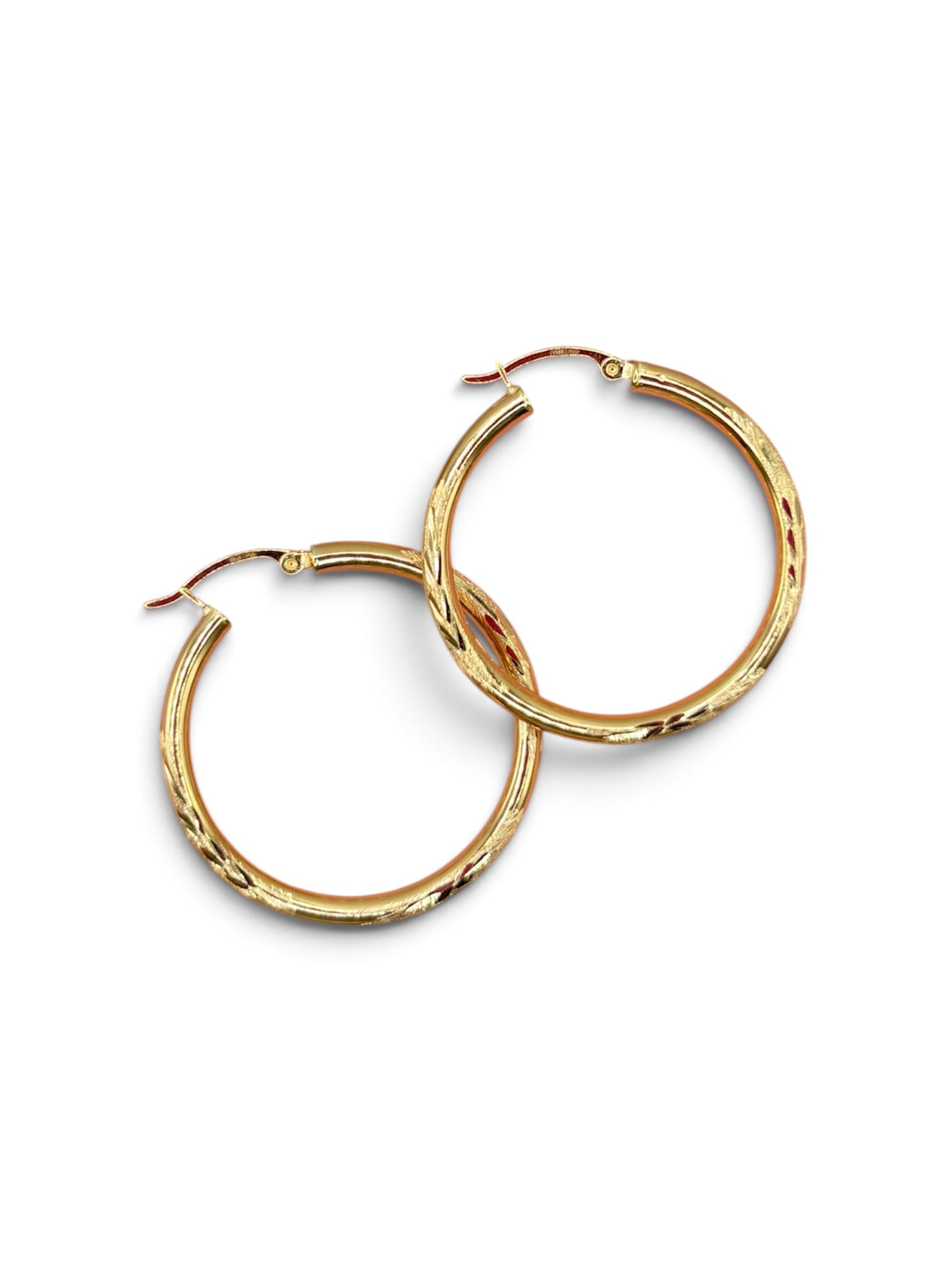 Hoop earrings with cut designs